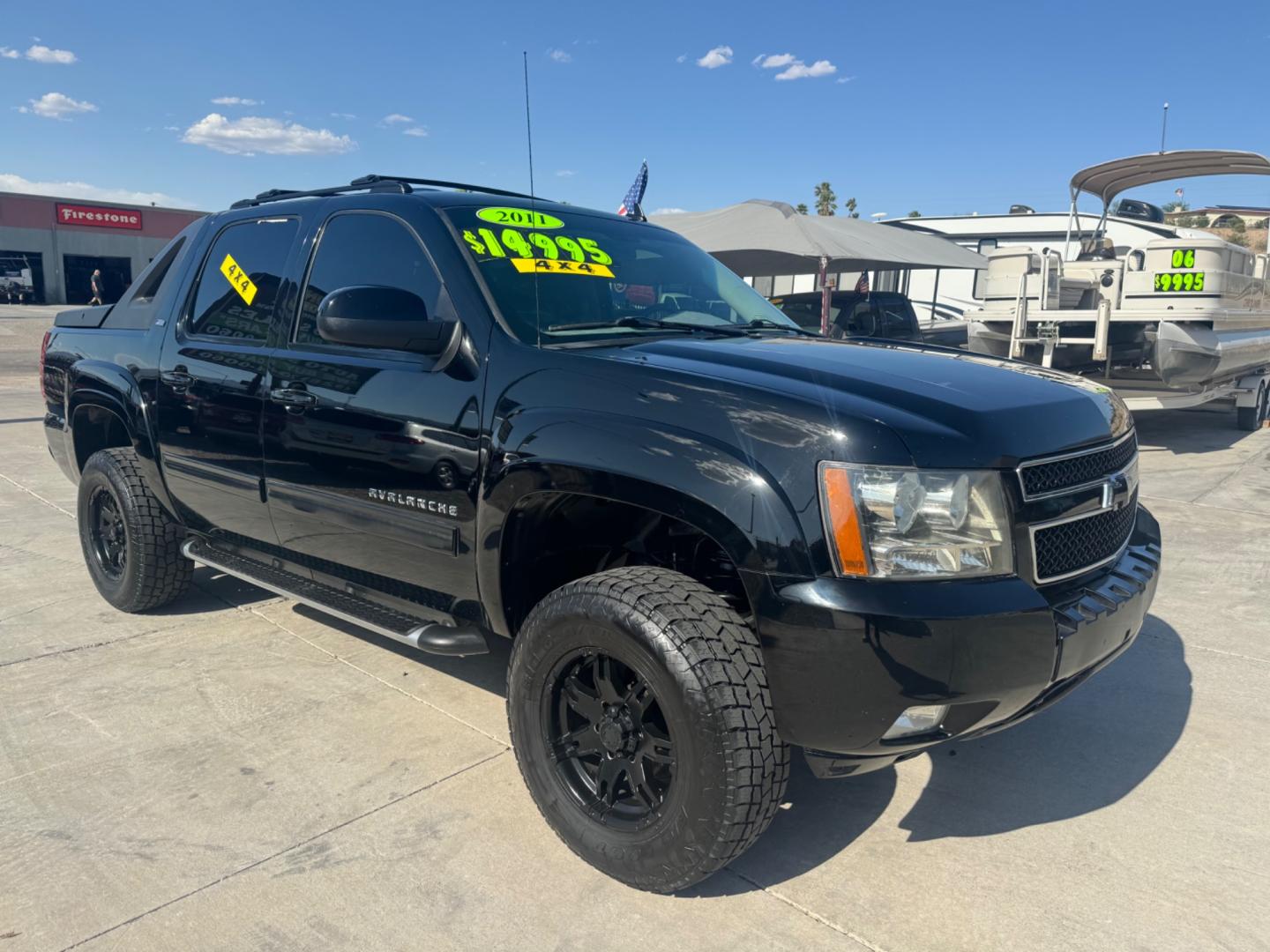 2011 Black /Black Chevrolet Avalanche (3GNTKFE31BG) , located at 2190 Hwy 95, Bullhead City, AZ, 86442, (928) 704-0060, 0.000000, 0.000000 - 2011 Chevrolet avalanche z71 . New motor with receipts . Lots of new parts . Lift kit , custom tires and wheels . 1 owner . Super clean , great running truck - Photo#8